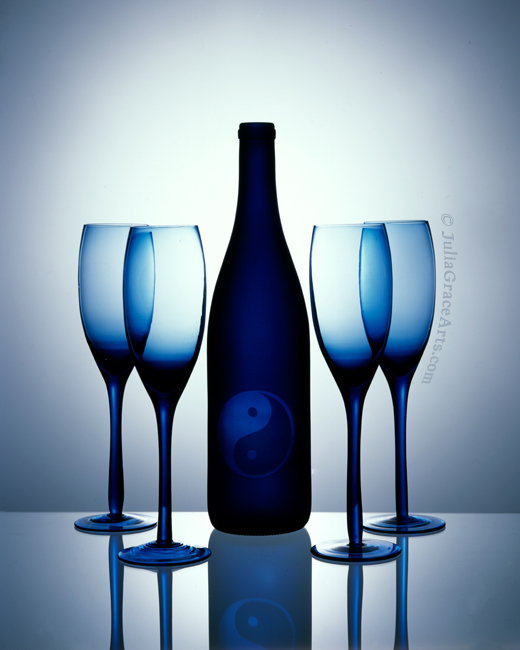 Blue wine bottle and glasses