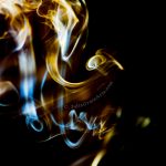Colorful wisps and swirls of incense smoke