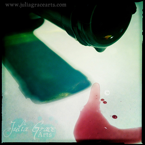 Red wine dripping from the bottle
