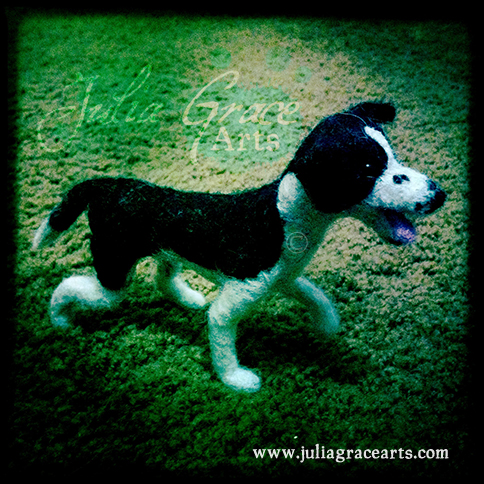 Blocking in the fur colors for the needle felted border collie