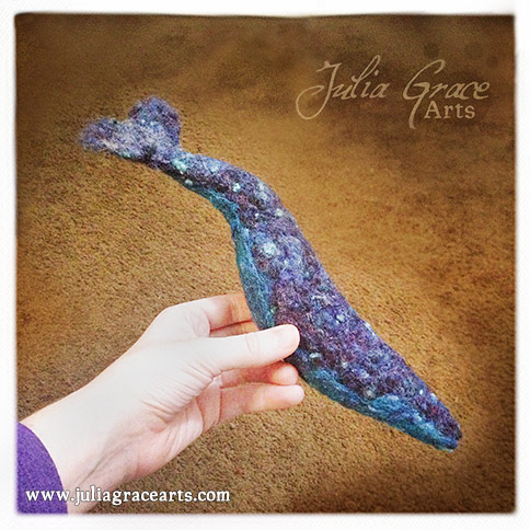 The needle felted whale sculpture now has its full shape and beginning of a tail